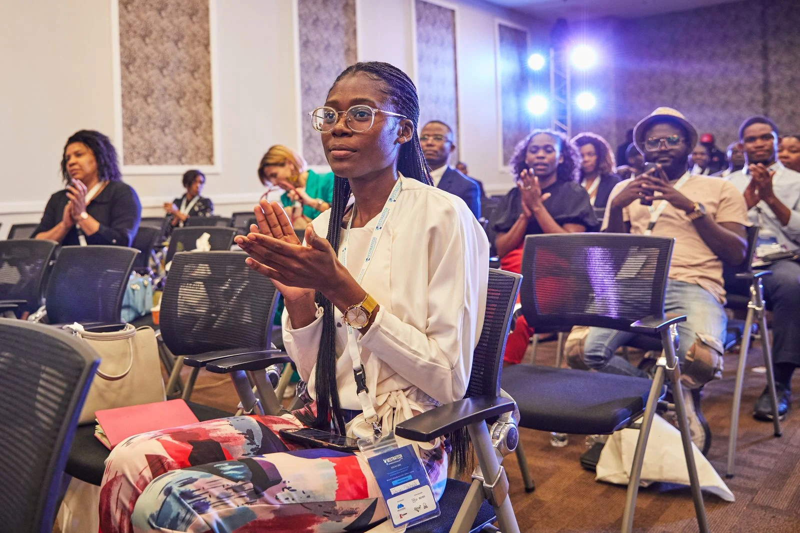 Conference audience applauding; illustrative stock photography