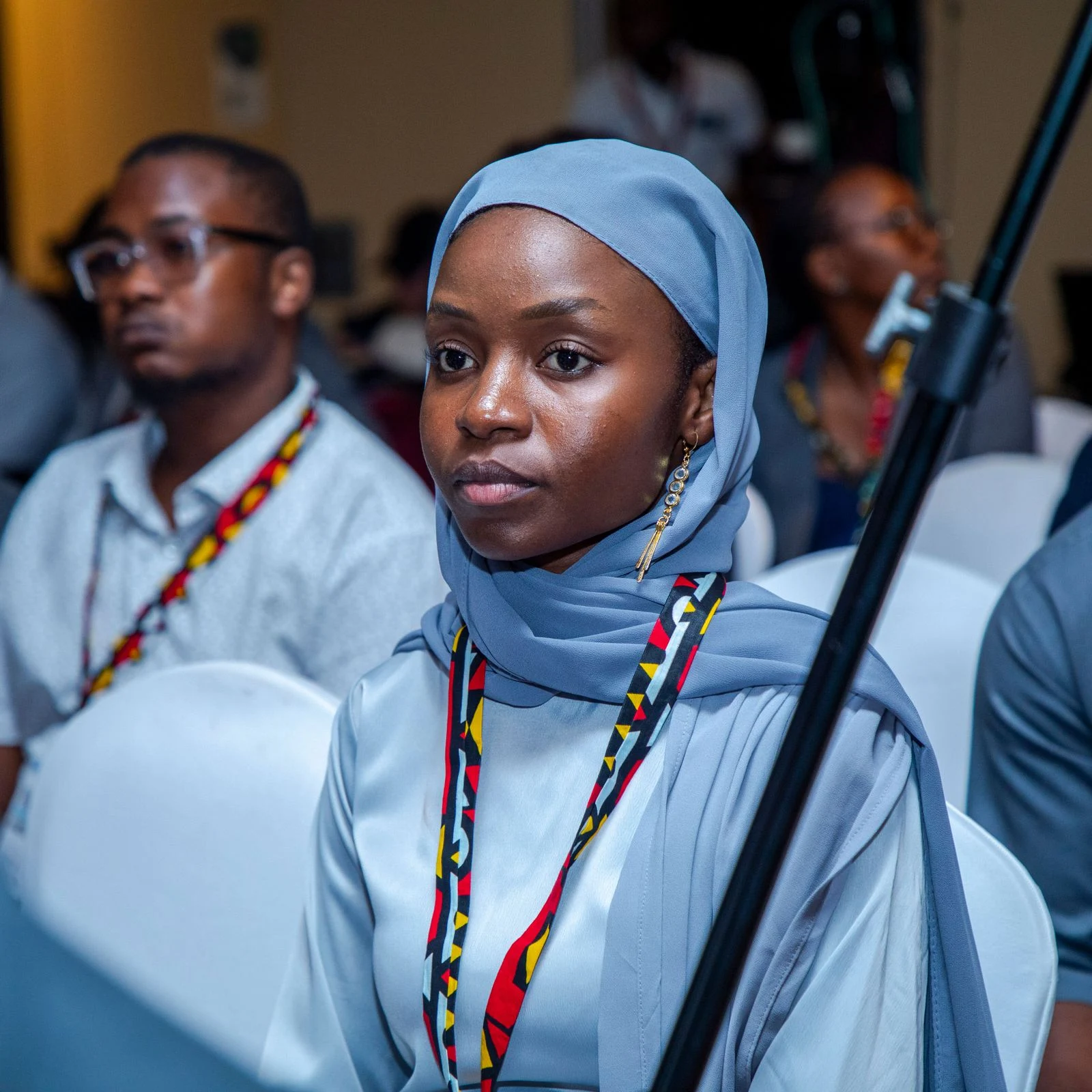 An attentive conference participant; illustrative stock photography
